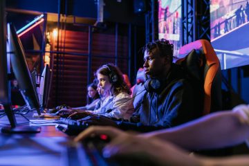Serious gamers engage in a competitive esports event, highlighting focus and teamwork. — How Responsible Gambling Is Supporte