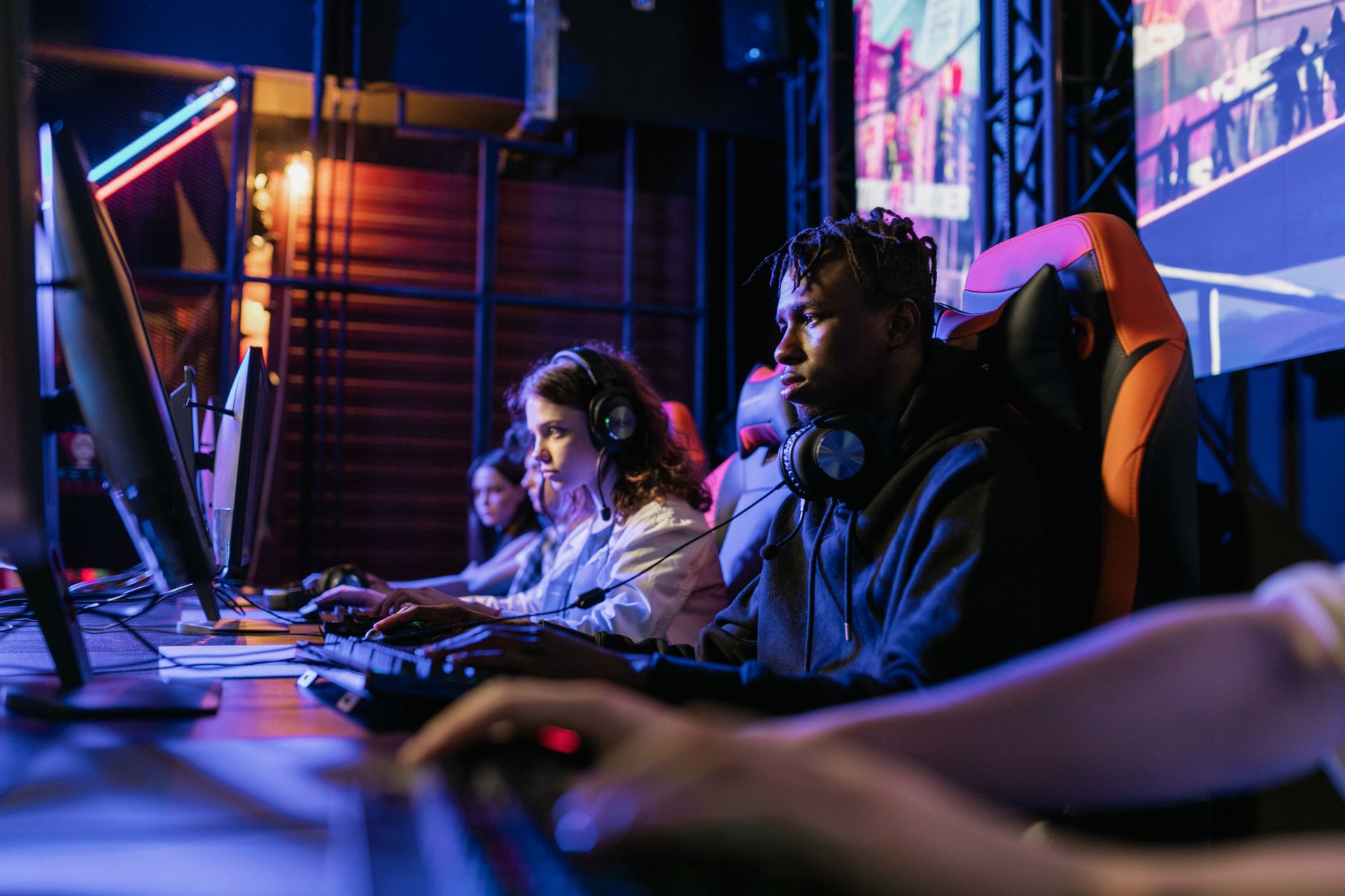 Serious gamers engage in a competitive esports event, highlighting focus and teamwork. — How Responsible Gambling Is Supporte