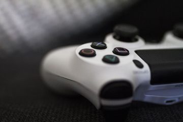 close-up of a gaming controller on a textured surface